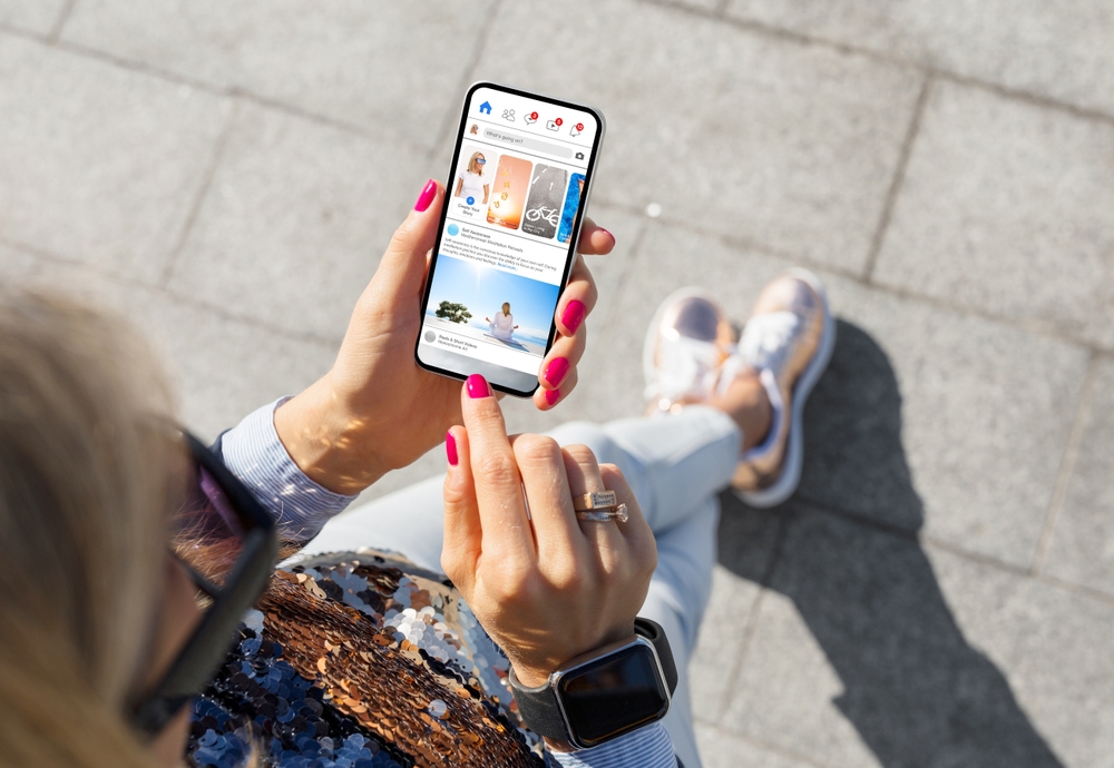 A woman checking social media on her mobile